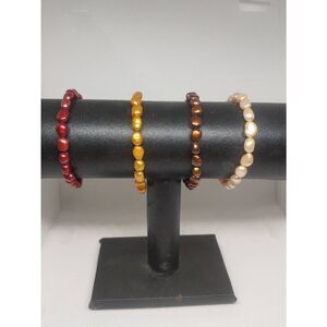 Set Of 4 Women's Ivory/Gold/Brown/Maroon Beaded Elastic Band Bracelets
